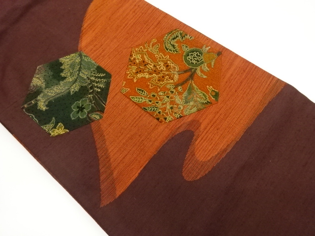 手織り紬切り嵌め相良刺繍亀甲に草花模様名古屋帯